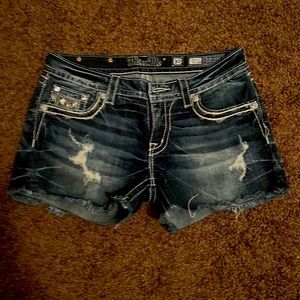 Miss me, super hot blue Jean shorts. Embellished with silver and bronze tones.
